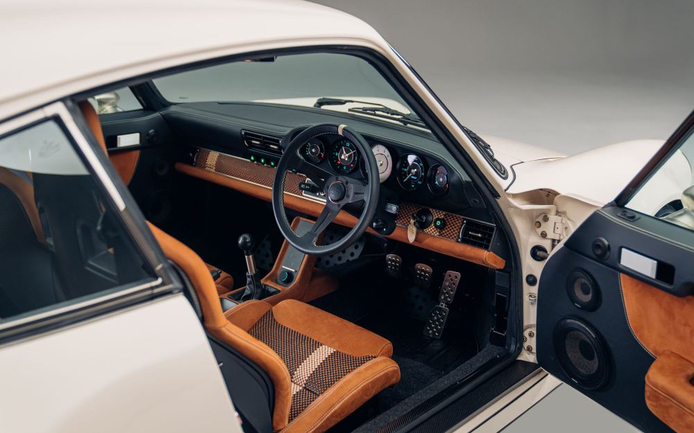 Cream Coupé, a Porsche 911 (964) reimagined by Theon Design: dashboard and seats seen through the open driver's door