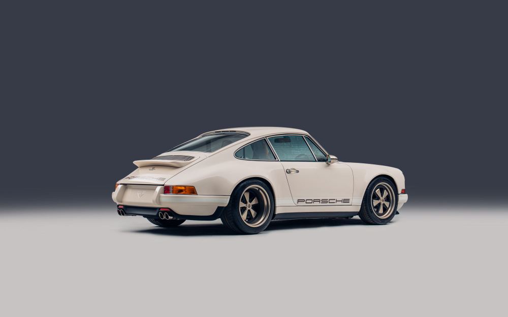 Cream Coupé, a Porsche 911 (964) reimagined by Theon Design: rear three-quarter view in the studio