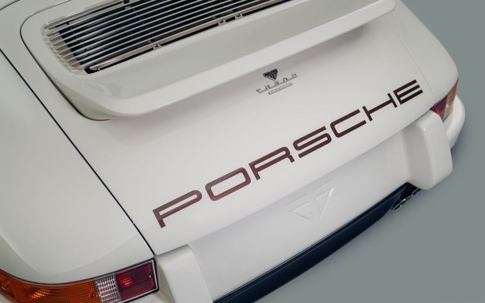 Cream Coupé, a Porsche 911 (964) reimagined by Theon Design: Porsche script beneath the engine lid grille