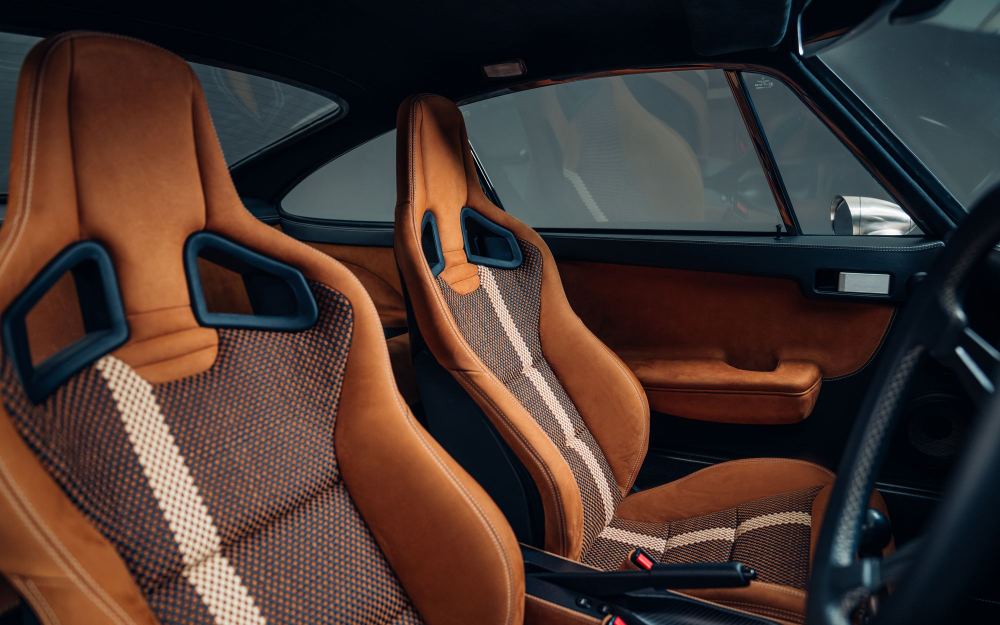Cream Coupé, a Porsche 911 (964) reimagined by Theon Design: tan leather and woven fabric sports seats, close-up