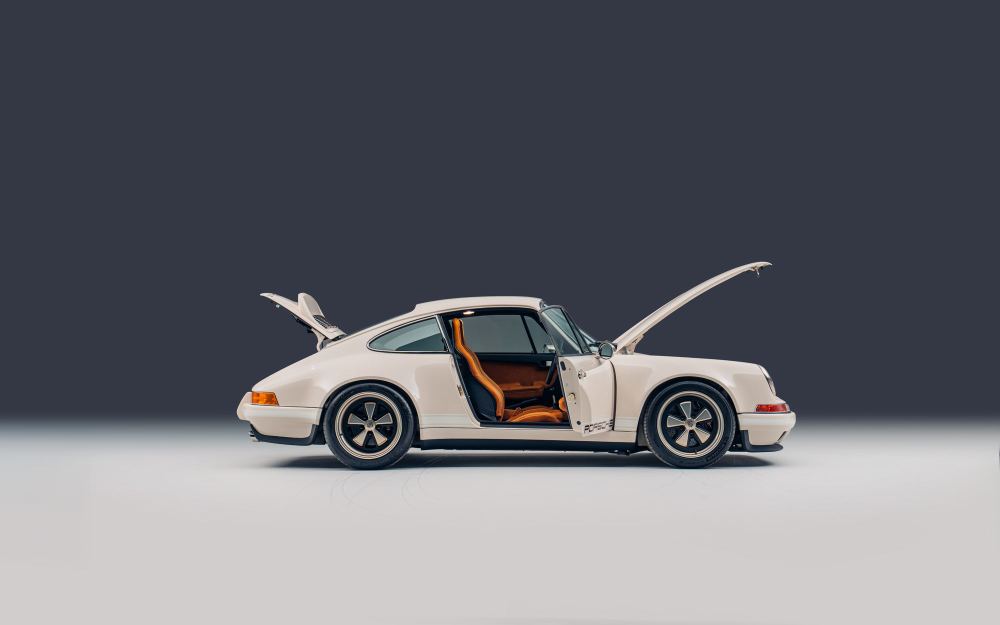 Cream Coupé, a Porsche 911 (964) reimagined by Theon Design: side view with the doors, luggage compartment and engine lid open