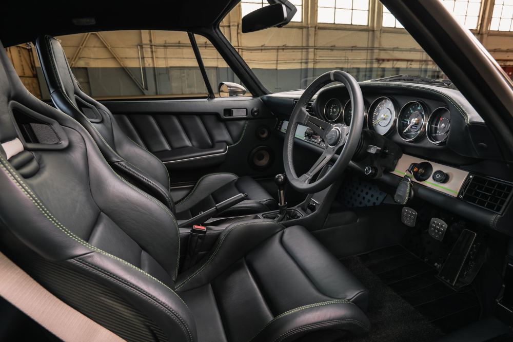 Silver Coupé, a Porsche 911 (964) reimagined by Theon Design: black leather interior and dashboard