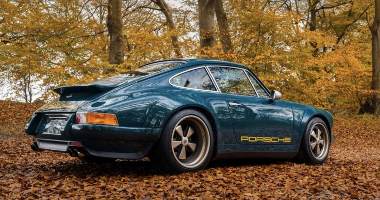 Theon Design bespoke Porsche 964 in dark olive green studio shot