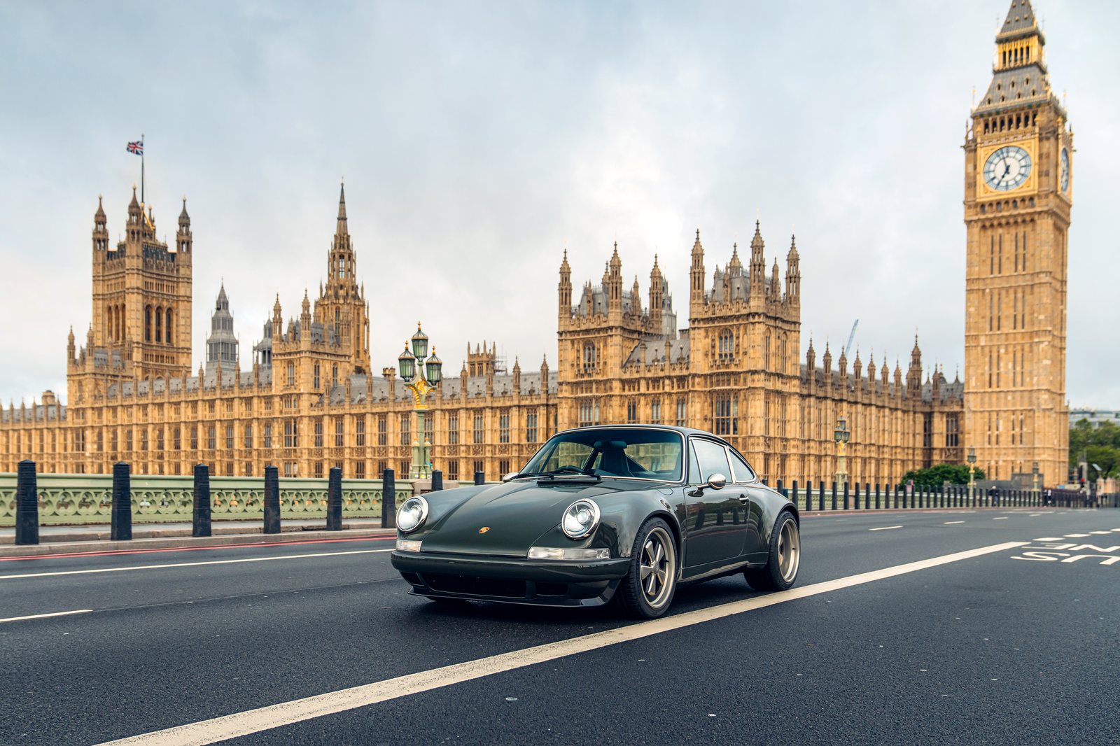 Theon Design Porsche 911 restomod crossing Westminster Bridge London