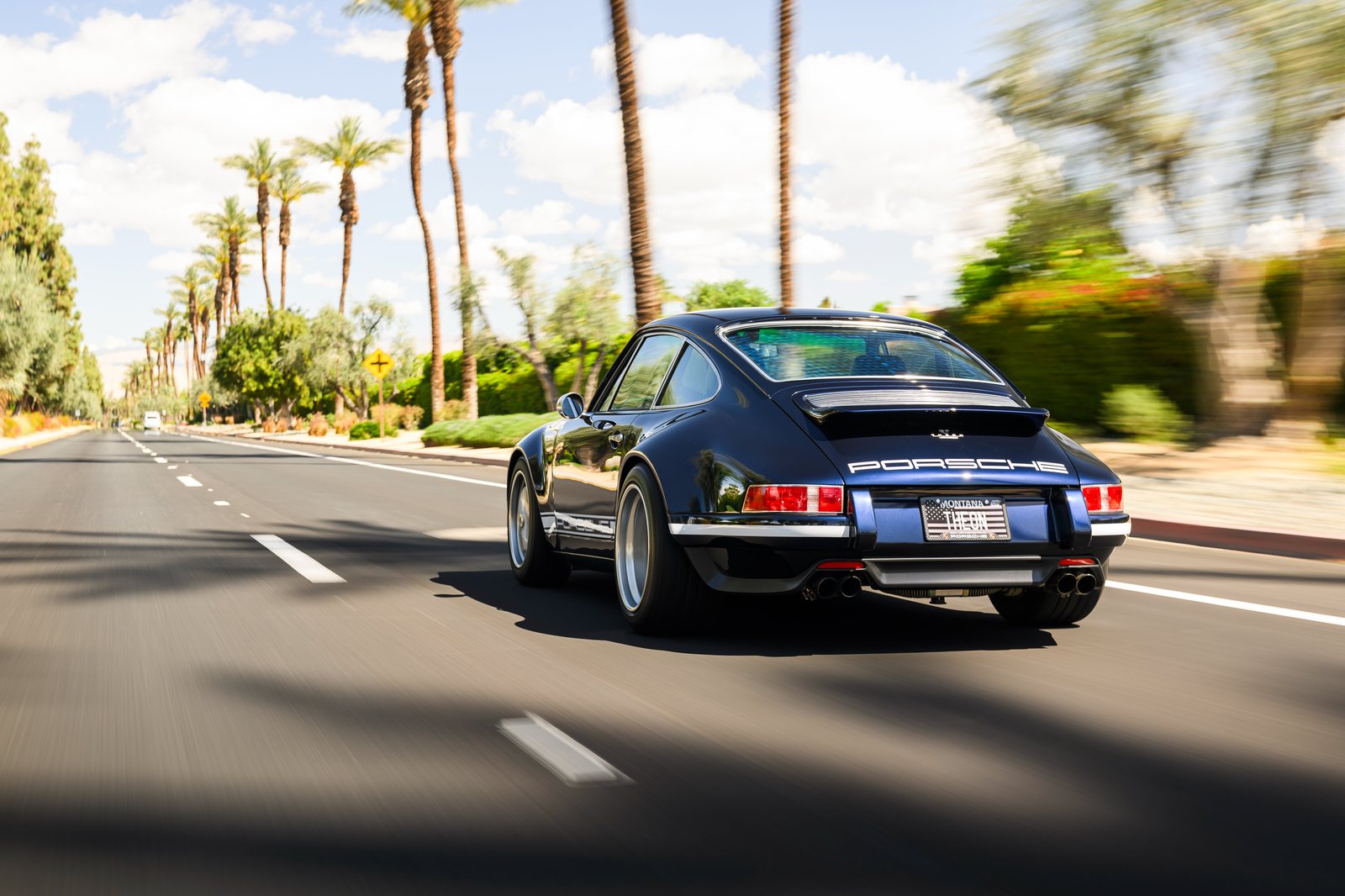 Theon Design USA001 Porsche 911 964 restomod driving through Palm Springs California